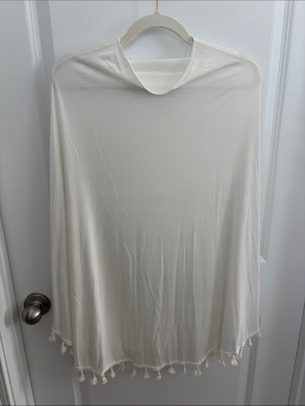 Ivory Tassel Hem Poncho Top